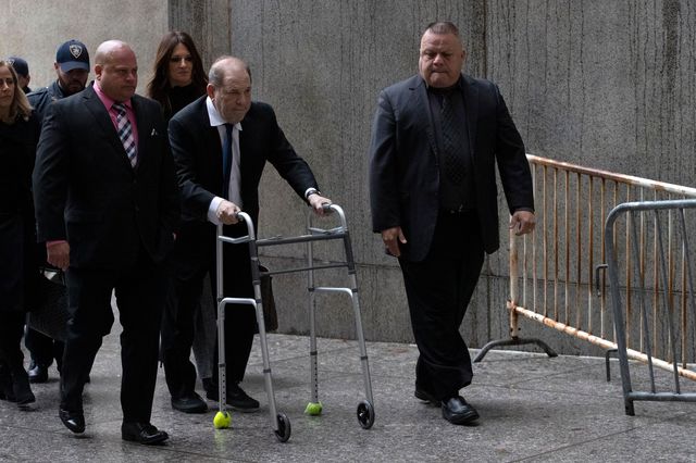 This is a photo of Harvey Weinstein leaving NYC court, using a walker.